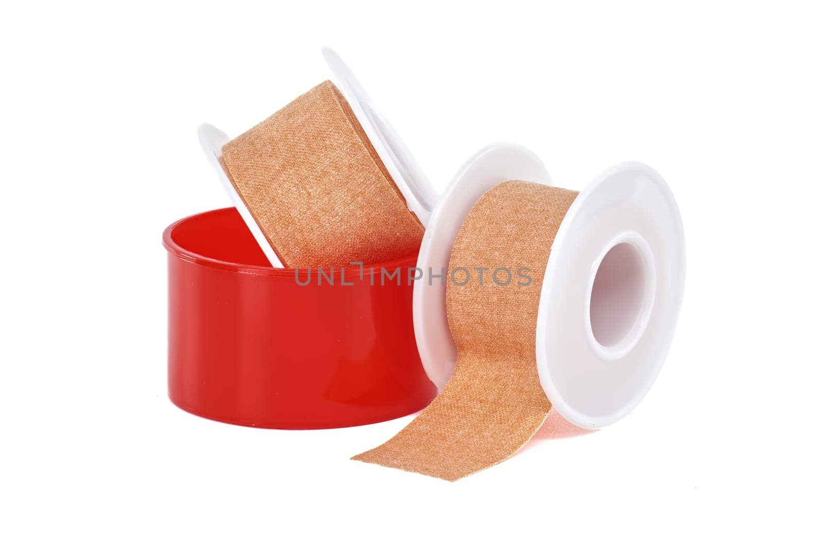 Two rolls of surgical adhesive plasters isolated on white background, medical supplies
