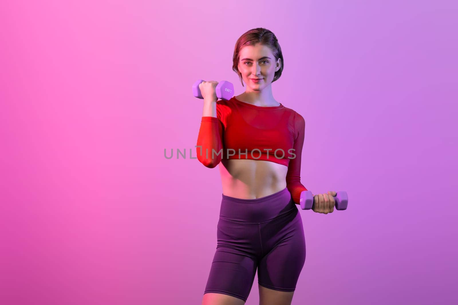 Full body length gaiety shot athletic and sporty woman with dumbbell by biancoblue