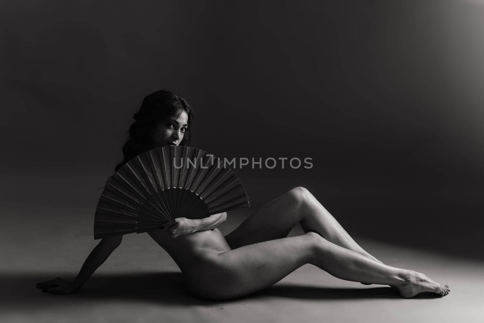 Female nude silhouette, a young seductive woman with naked body