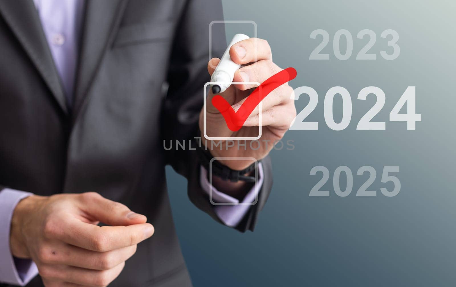 man hand touching on 2024 calender year button on digital virtual screen blur background. High quality photo