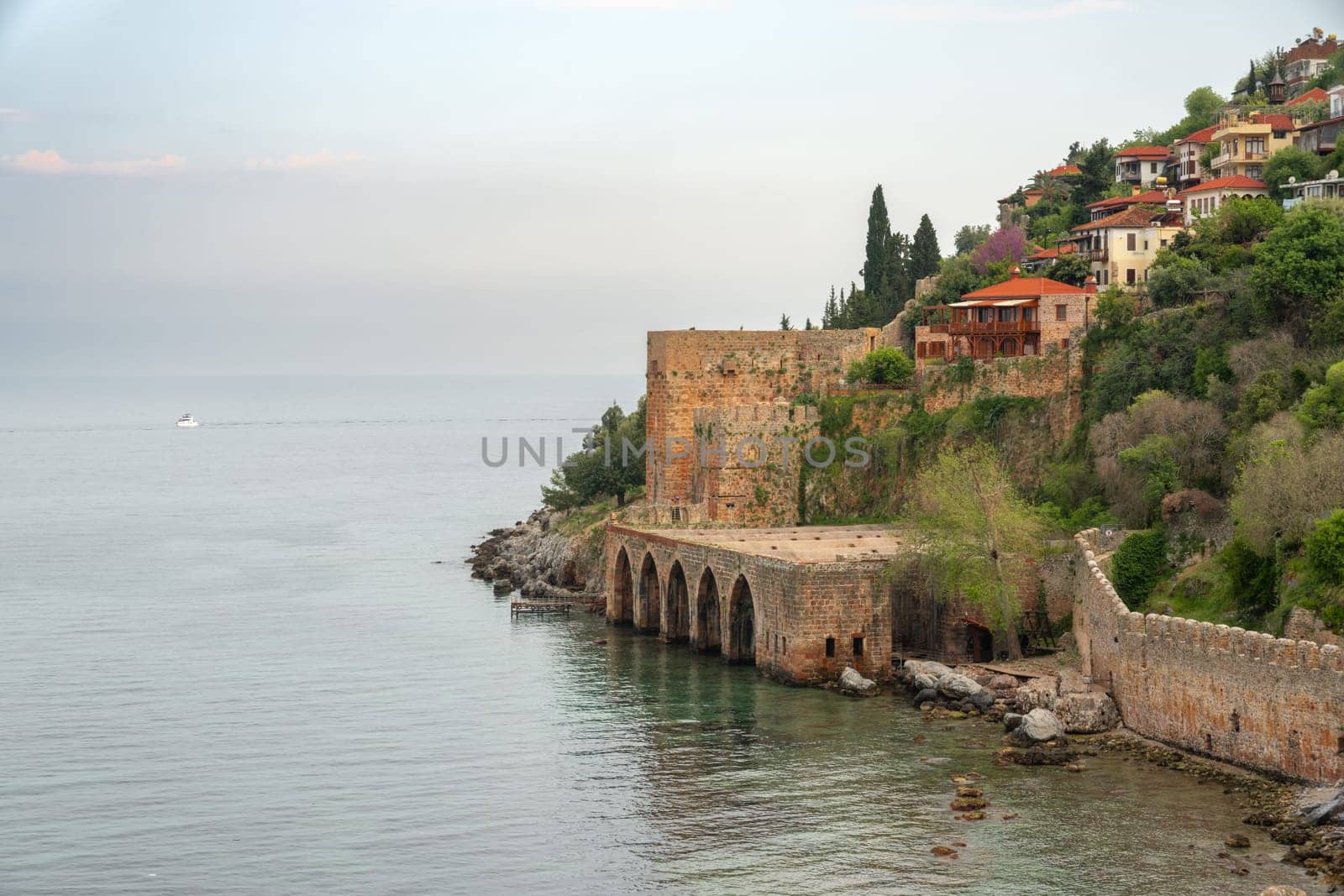 Historical Alanya Shipyard and Kizil Kule walls located in Alanya district of Antalya by Sonat