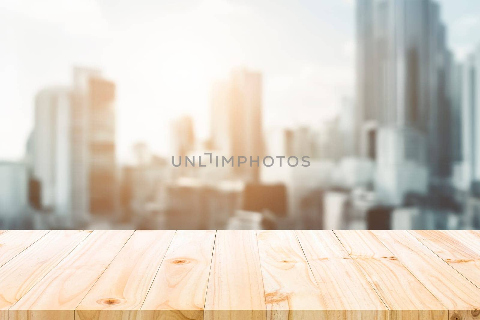 Pine wood table top overlooking a blurred cityscape, ideal for display or montage with urban context.