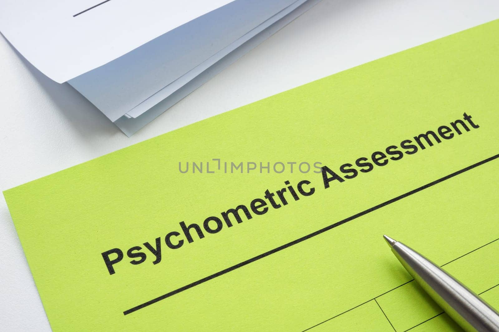 Psychometric assessment form, a pen and papers.