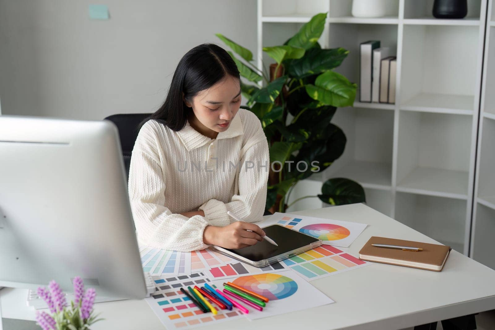 Asian woman graphic designer working in home office. Artist creative designer illustrator graphic skill concept by nateemee