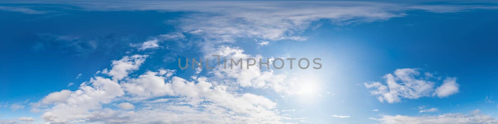 360 panorama of glowing sunset sky with bright Cirrus clouds. Seamless hdr spherical 360 panorama. Sky dome in 3D visualization, sky replacement for aerial drone panoramas. Weather and climate change.
