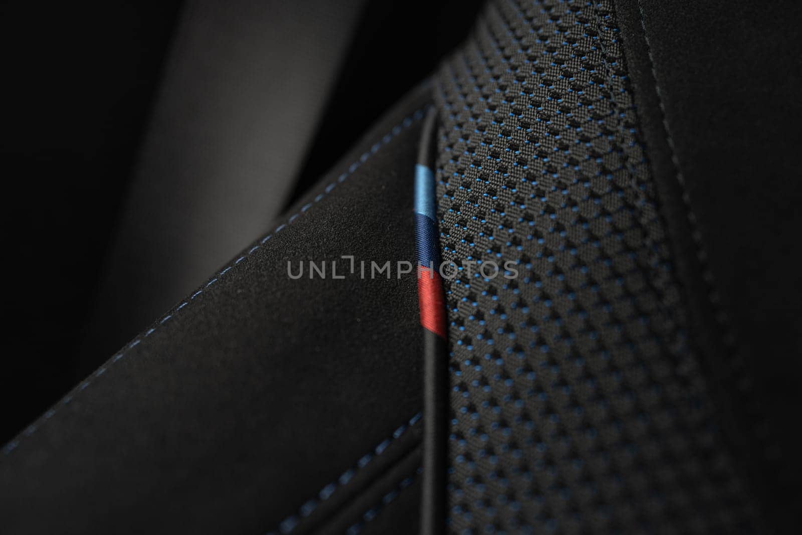 BMW M-package black alcantara texture car seat. . High quality photo.