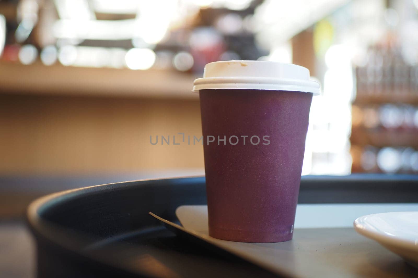 Blank take away kraft coffee cup on table , by towfiq007