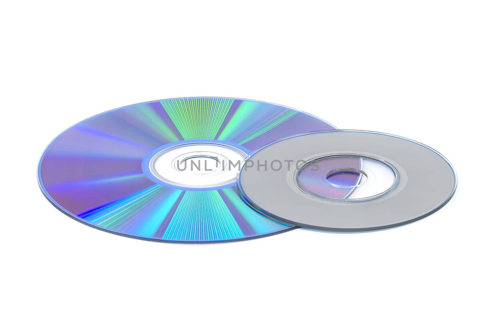 Close up of a CD positioned flat on a plain white background. The CD's reflective surface showcasing the intricate spiral track pattern that represents data storage