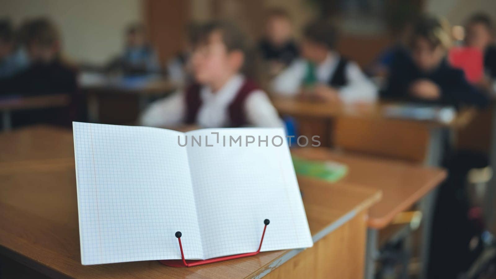 Notebook on a stand in the classroom during a lesson