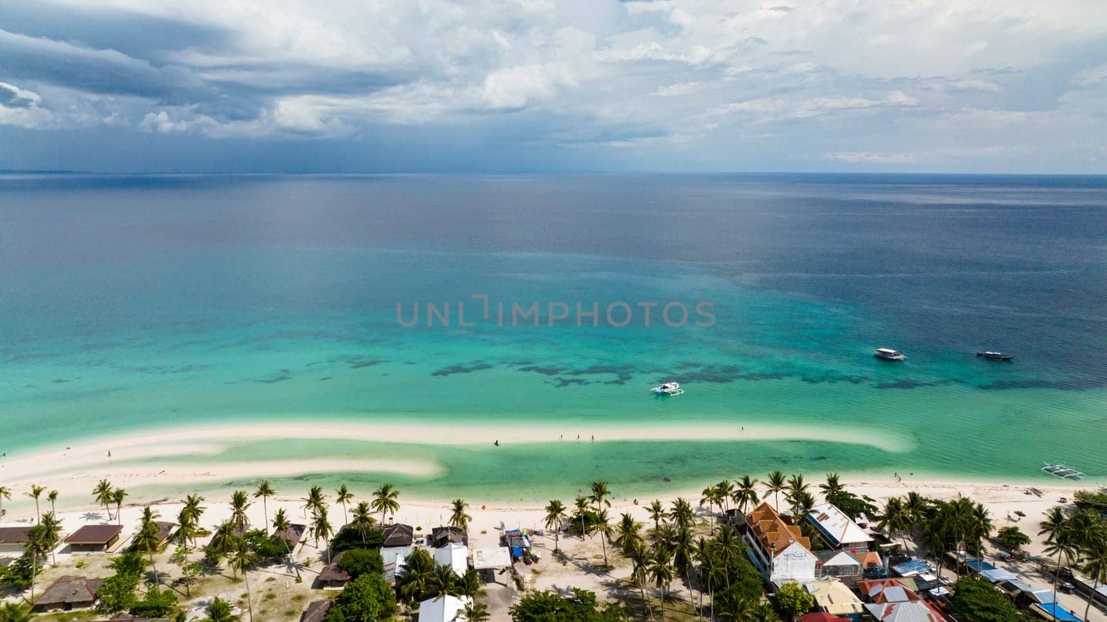 Tropical sandy beach and blue sea. Philippines by Alexpunker