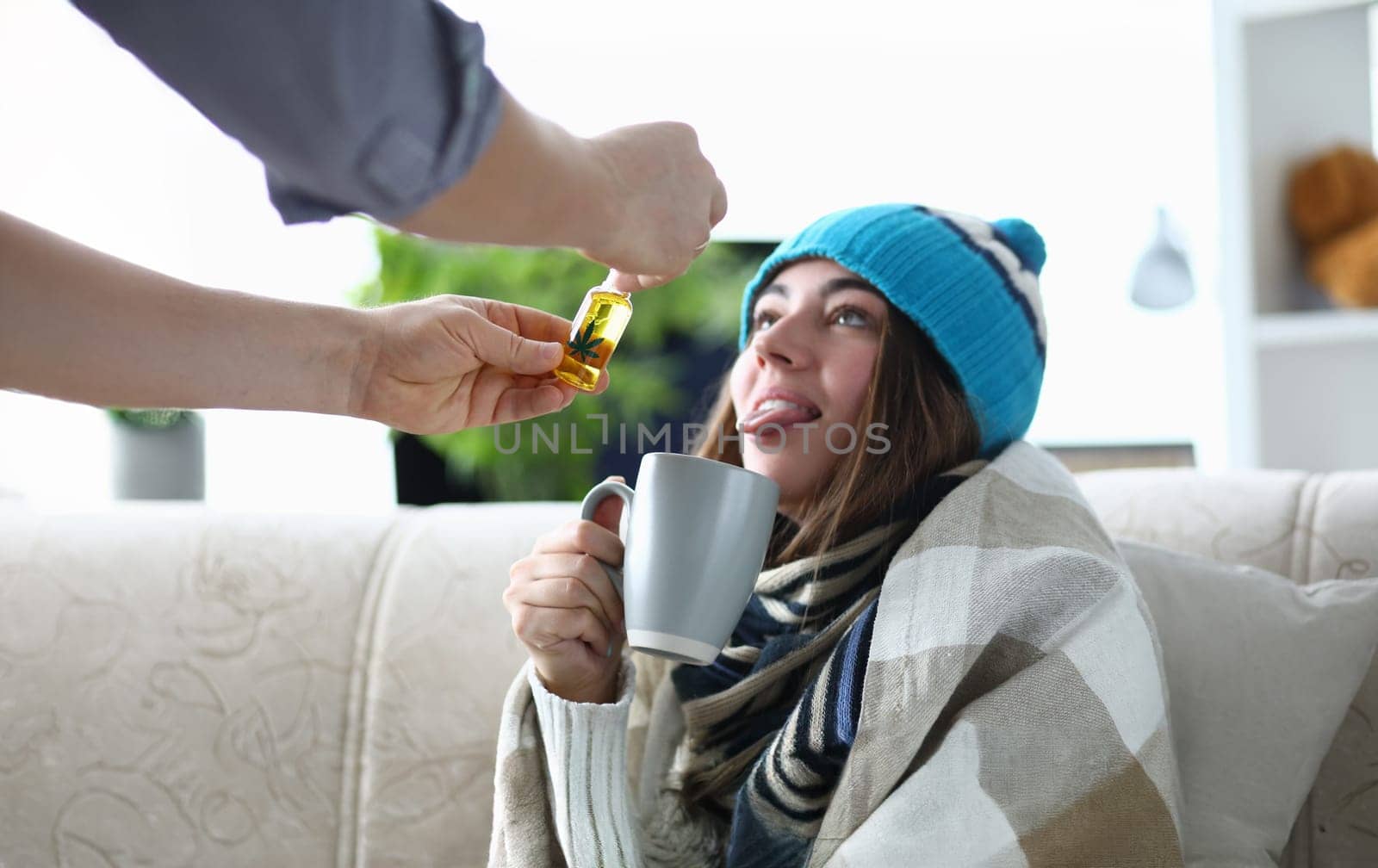 Husband adds marijuana oil extract to sick wife in tea. Caring for your beloved concept