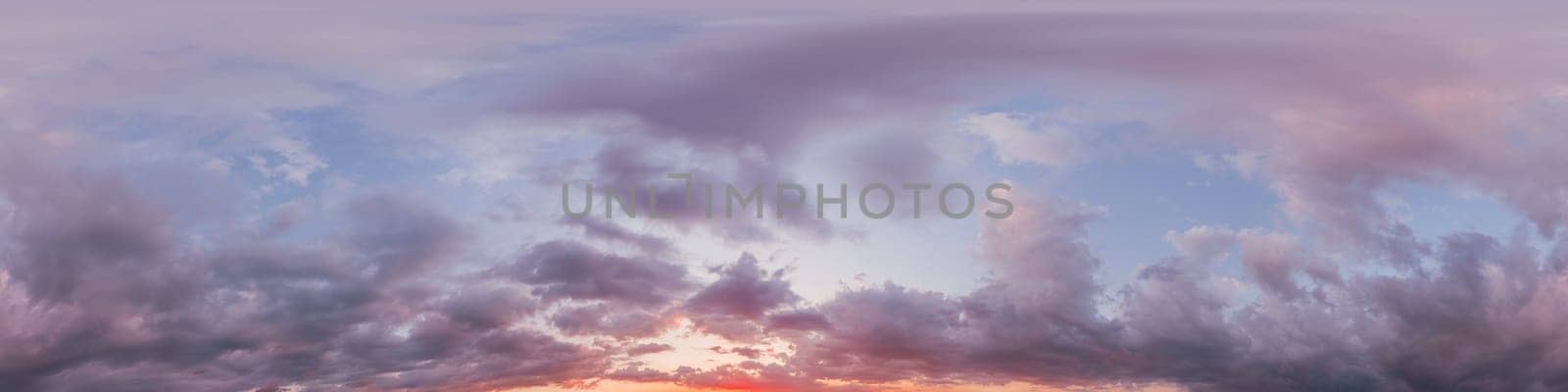 Dramatic Sunset sky 360 panorama. Vibrant sky with bright glowing red pink Cumulus clouds. HDR 360 seamless spherical panorama. Sky dome for aerial drone panoramas. Climate and weather change