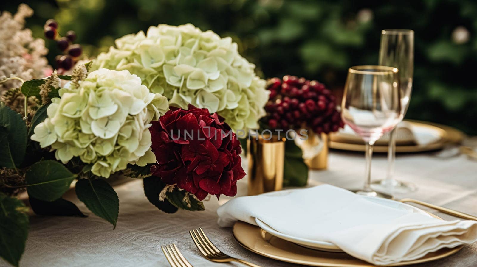 Wedding or formal dinner holiday celebration tablescape with hydrangea flowers in the English countryside garden, table setting and wine, floral table decor for family dinner party, home styling by Anneleven