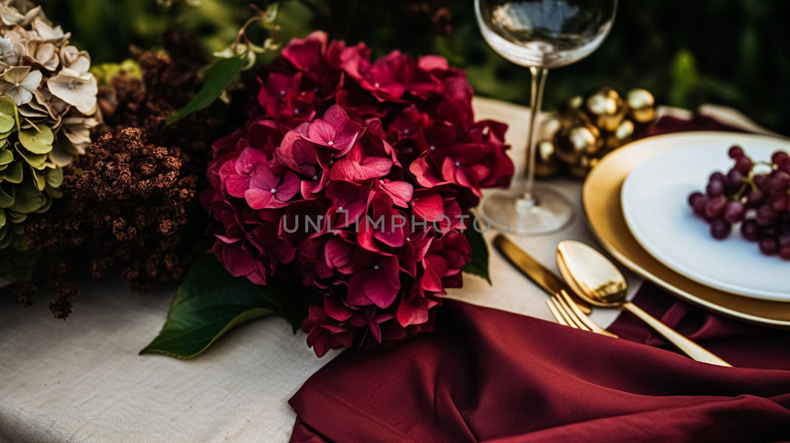 Wedding or formal dinner holiday celebration tablescape with hydrangea flowers in the English countryside garden, table setting and wine, floral table decor for family dinner party, home styling inspiration