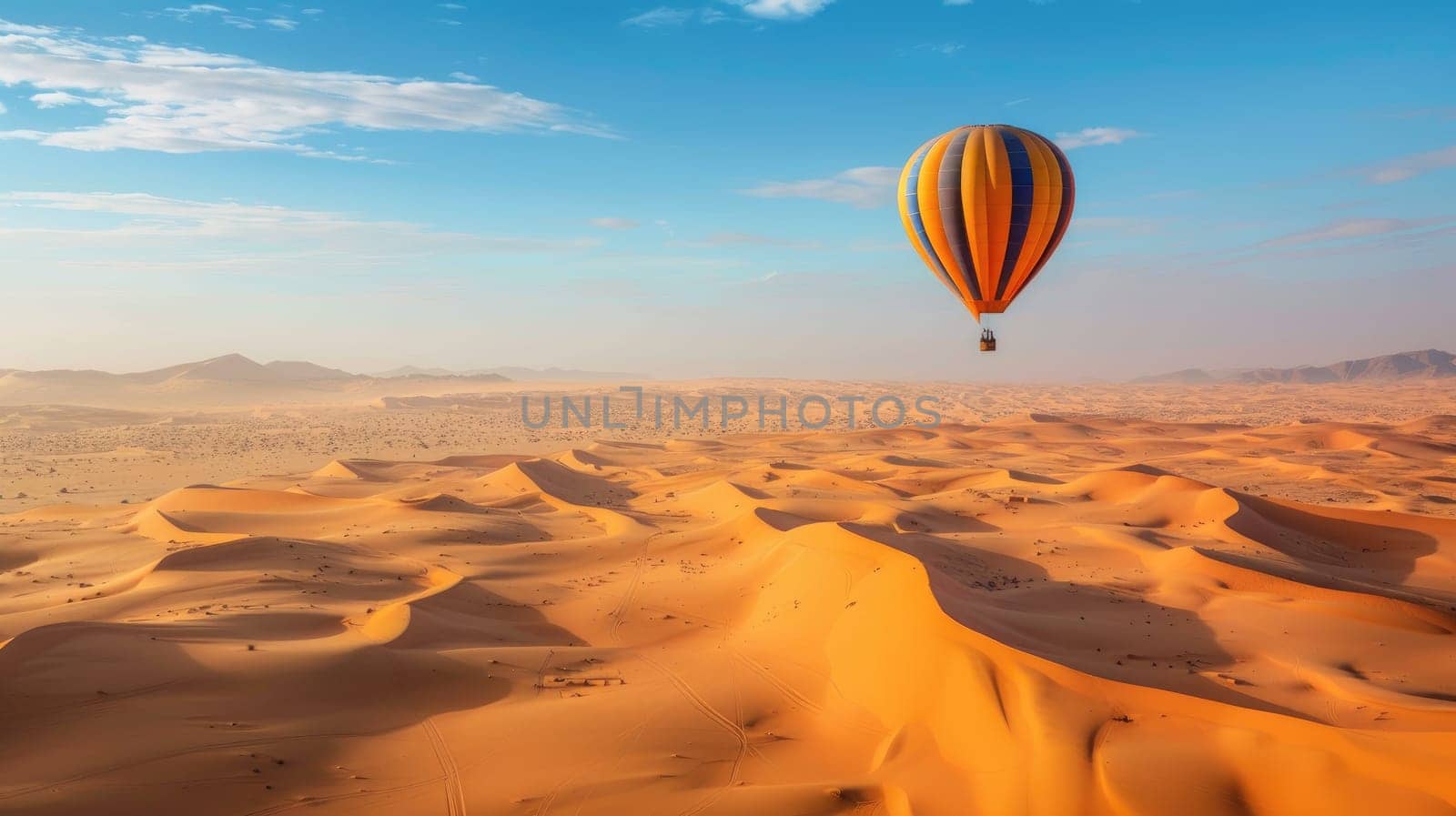 Hot air balloon floating over desert in sahara with copy space area