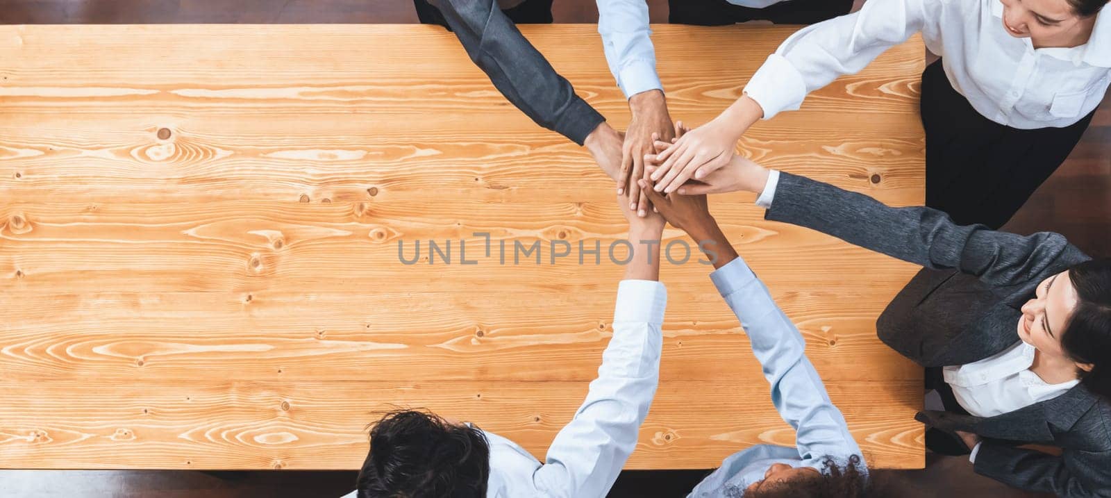 Top view panoramic banner hand stack by office worker show solidarity teamwork and trust in workplace. Diverse businesspeople unite for success with synergy and collaboration by hand stacking. Concord