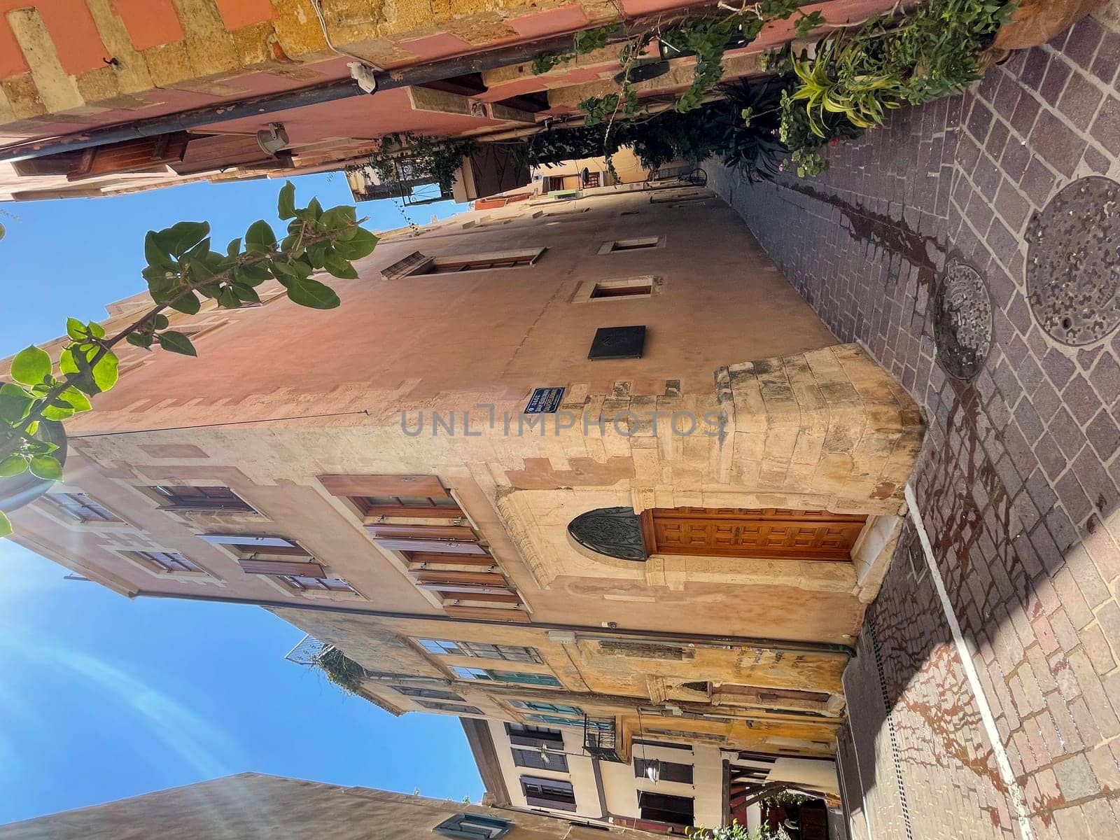 Beautiful old buildings, streets, stairs and alley ways in the town of Chania, Greece at 10 August 2023. High quality photo
