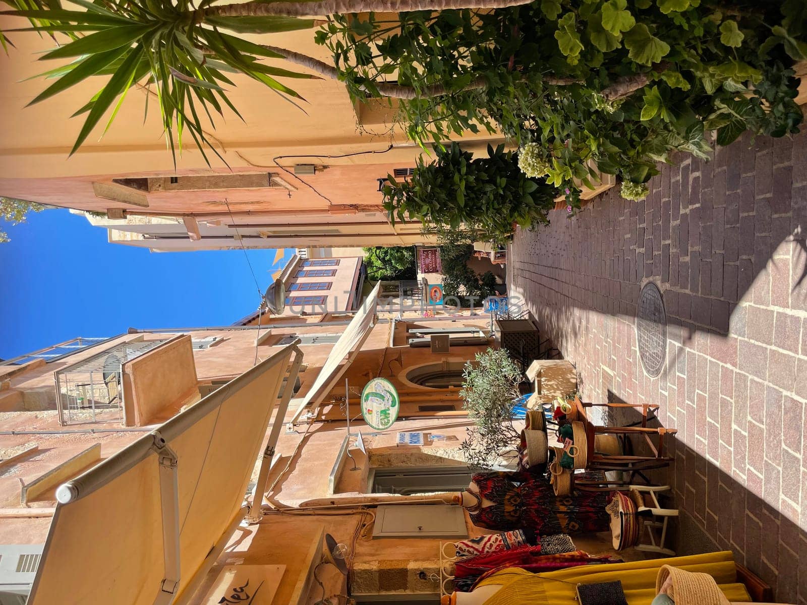 Beautiful old buildings, streets, stairs and alley ways in the town of Chania, Greece at 10 August 2023 by Costin