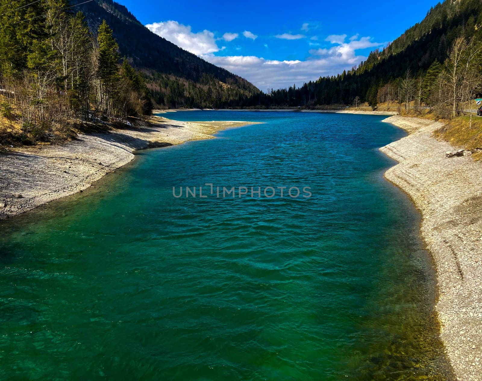 Faboulus landscape of mountain river with turquoise water near of Zugspitze summit under sunlight. alps, Austria, Europe. by Costin