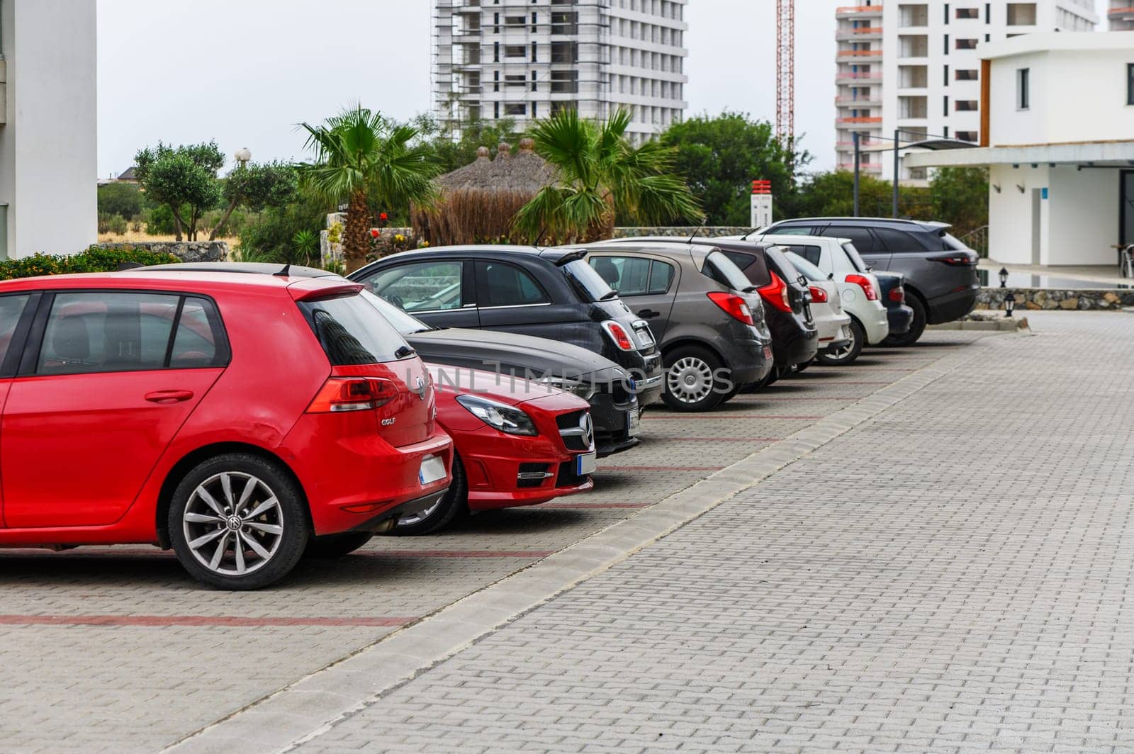 Cars parked in front of a modern residential complex in Cyprus 2