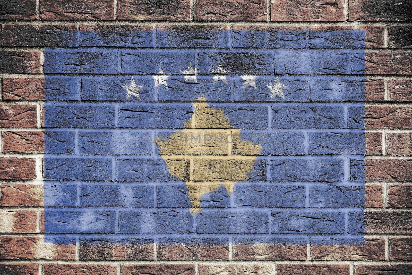 Kosovo flag on brick wall by VivacityImages