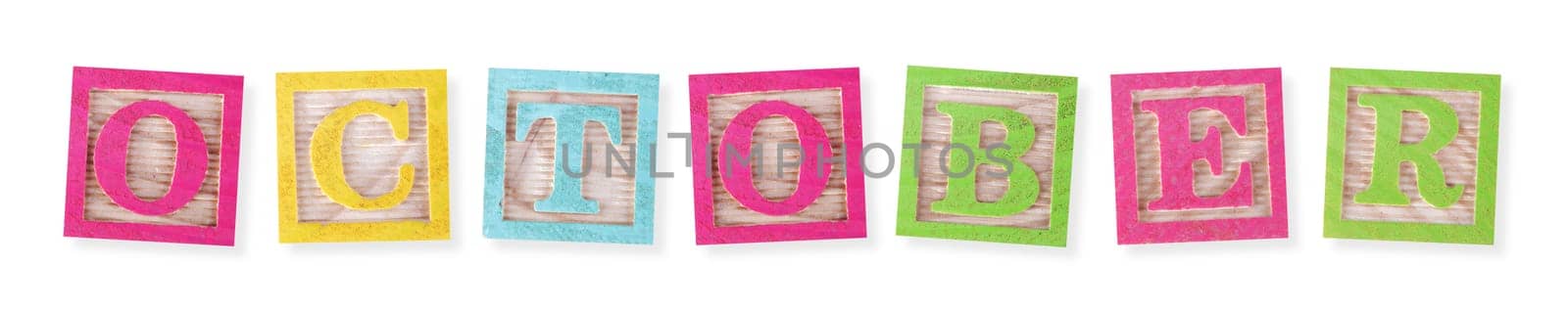 An October concept with childs wood blocks on white with clipping path to remove shadow