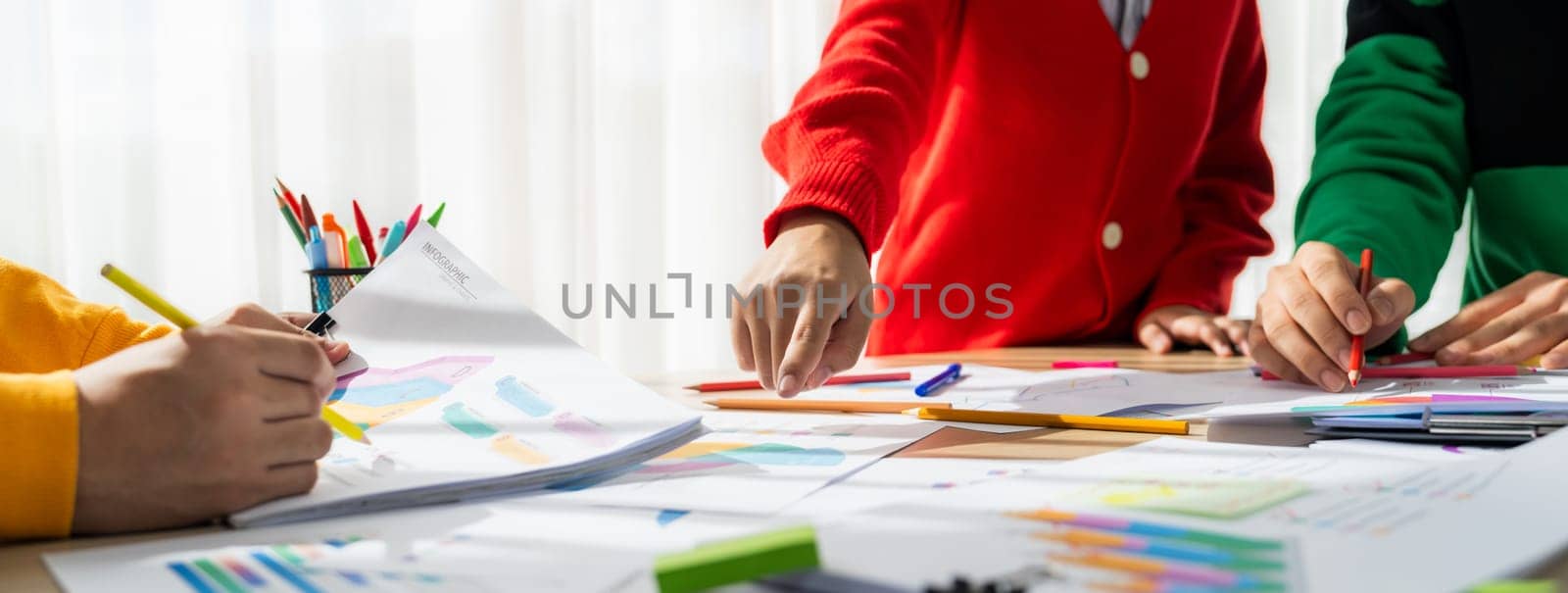 Startup company employee working together, analyzing BI dashboard paper on financial data report and planning strategic marketing for business success in panorama banner. Synergic