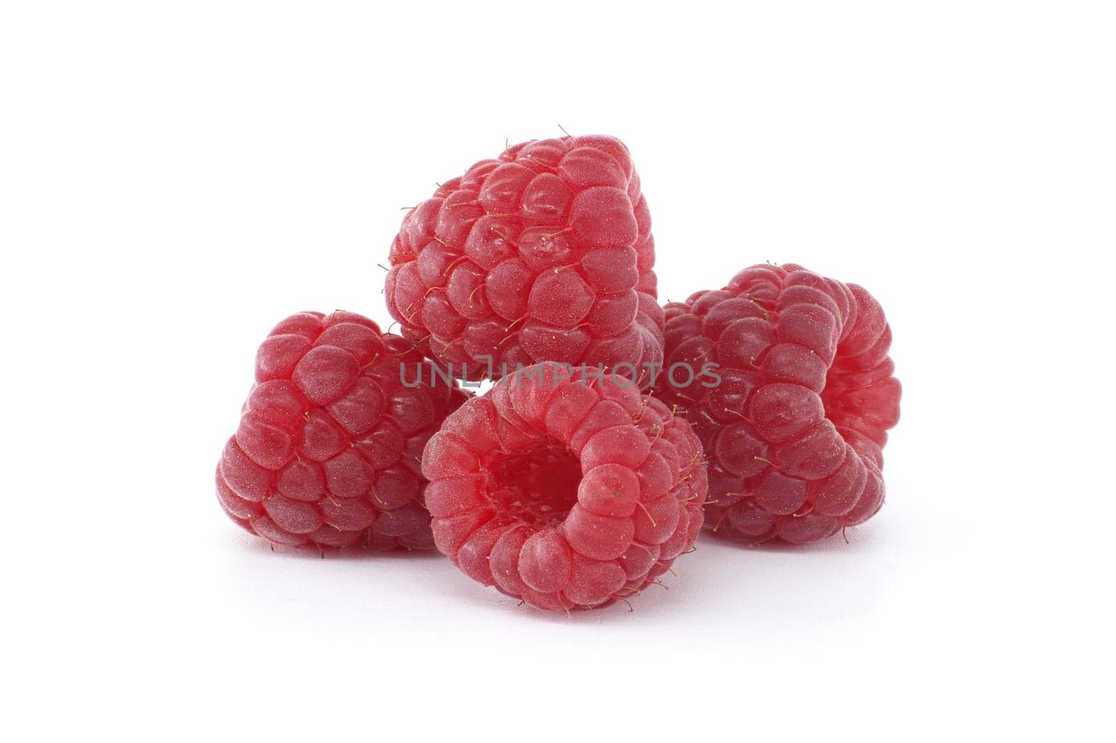 Raspberry berries isolated on white background by NetPix