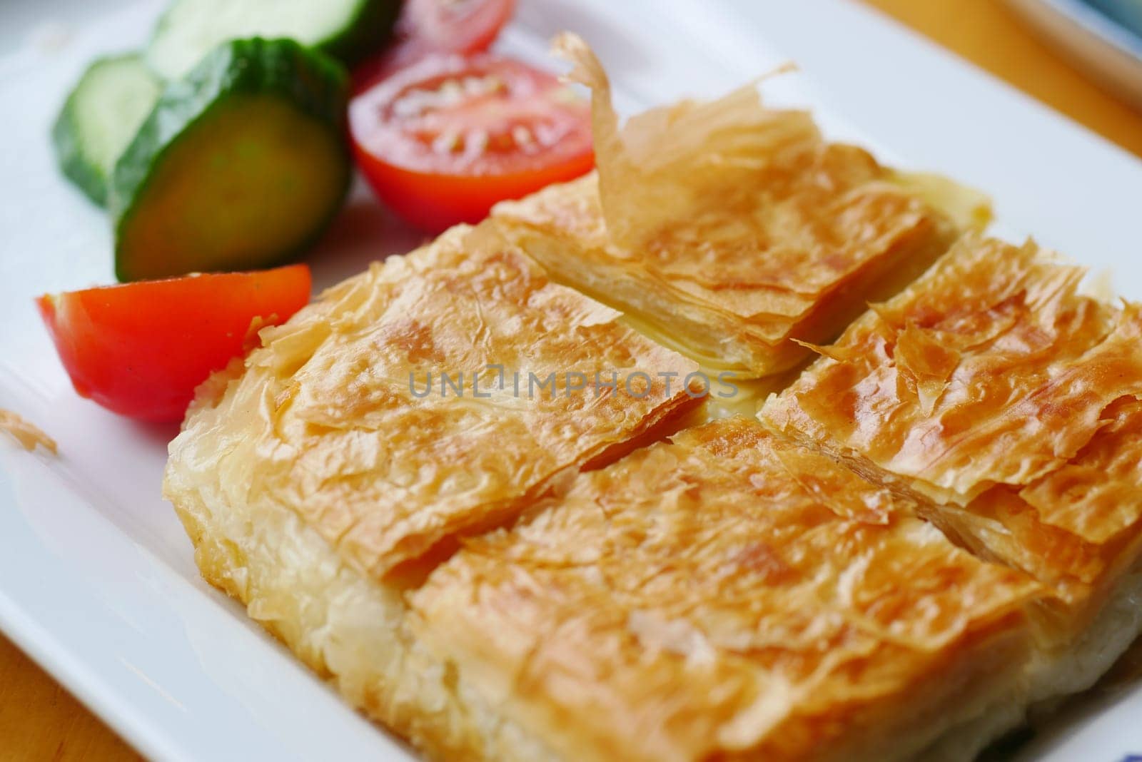 Traditional Turkish Cuisine Pastries borek on a plate by towfiq007