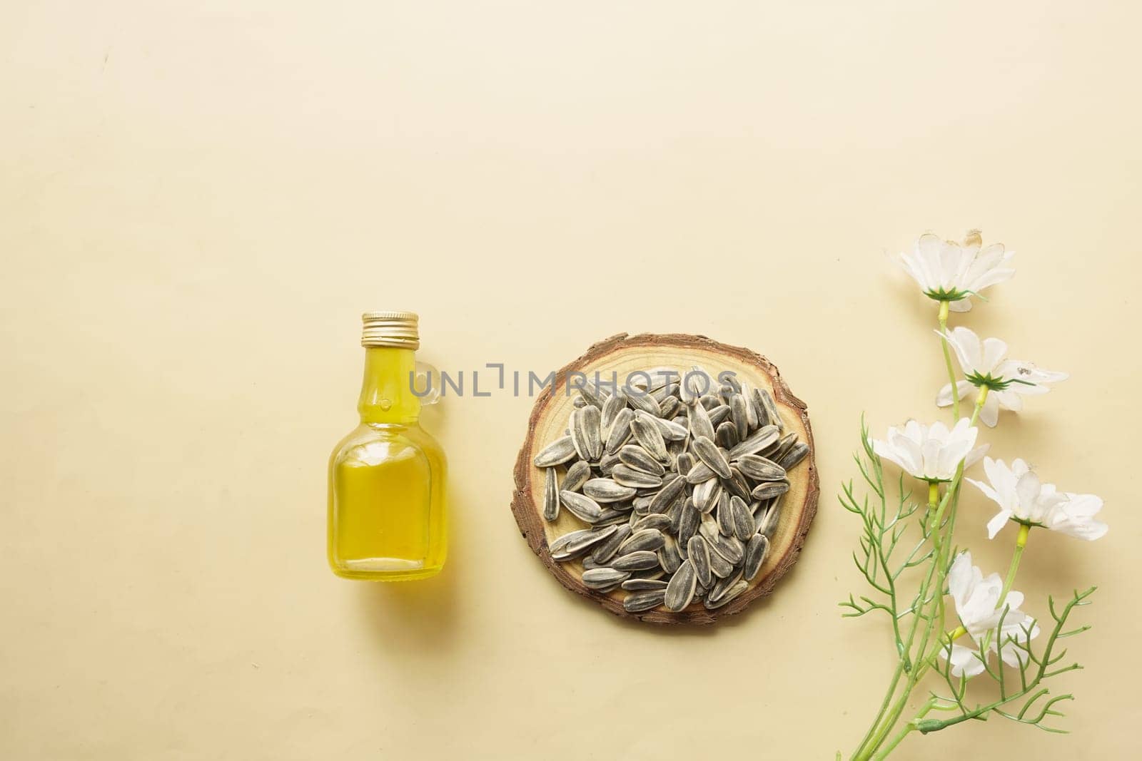 sunflower oil seed and oil in a container on table ,