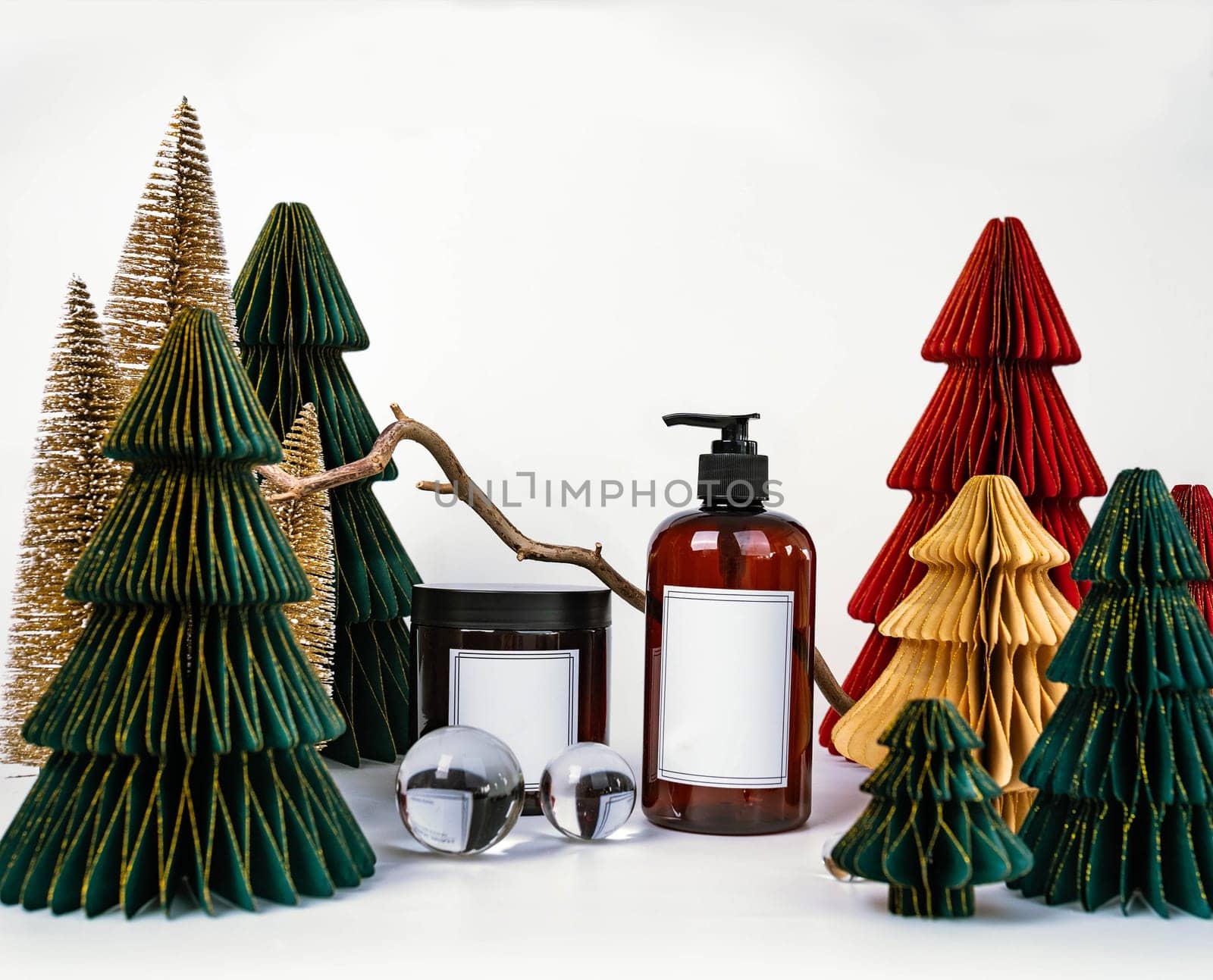 dark jar with lid and dispenser on the background of Christmas decorations, side view by tewolf