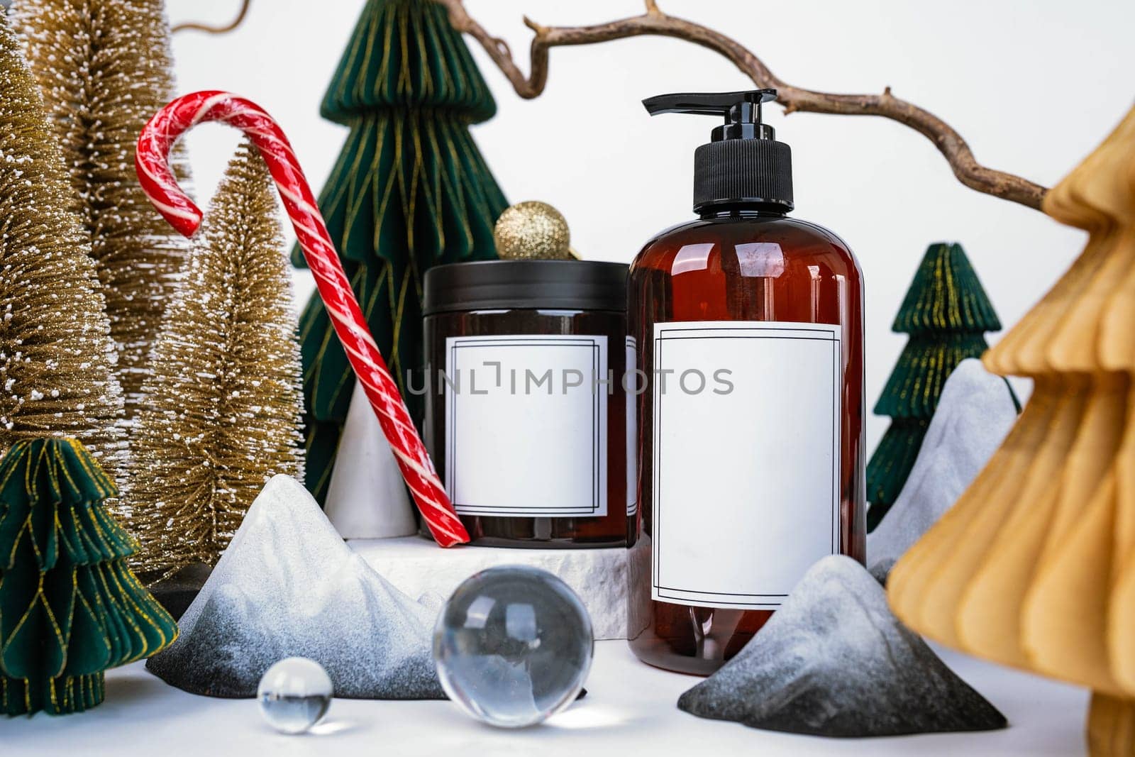 dark jar with lid and dispenser on the background of Christmas decorations