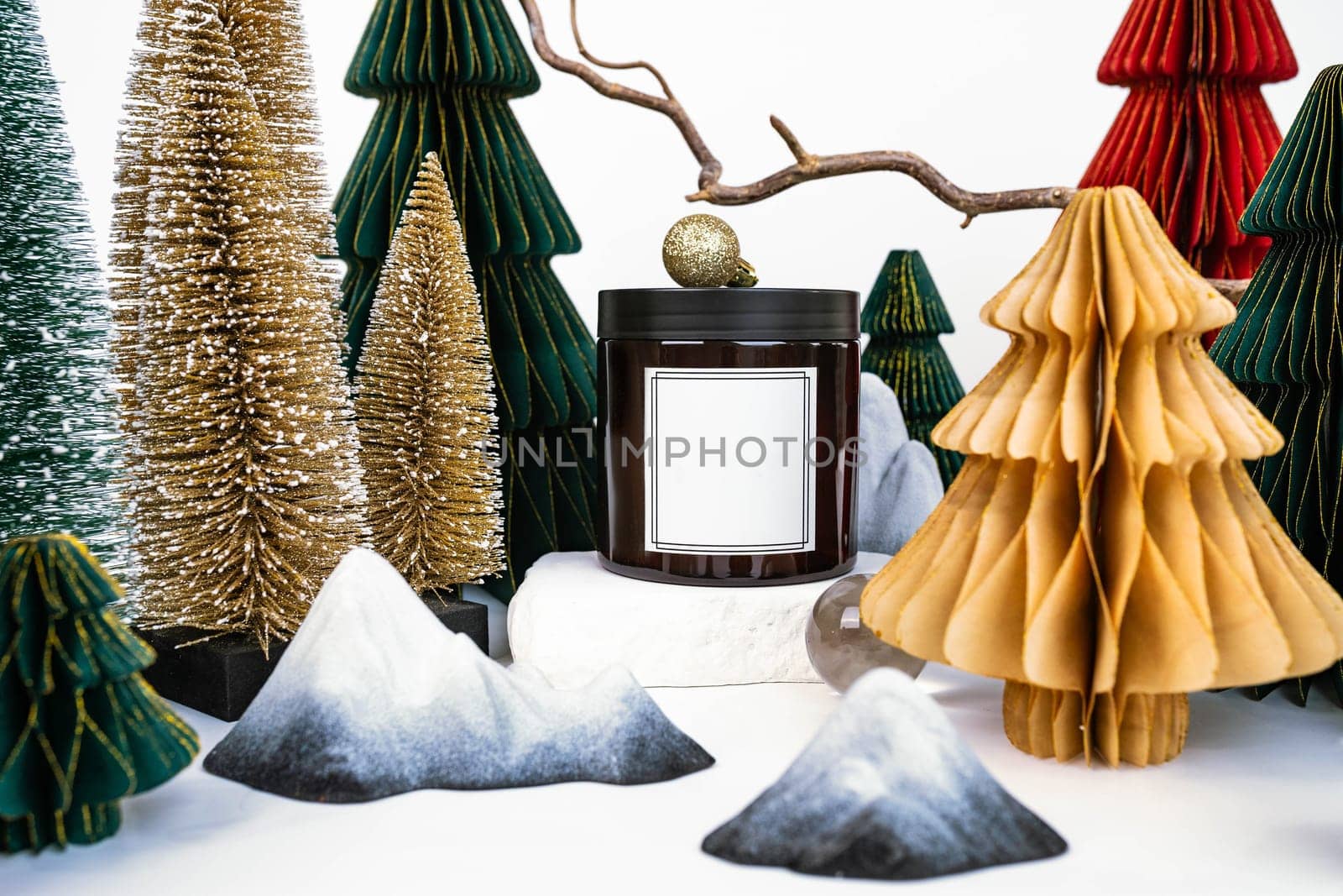 dark jar with lid on the background of Christmas decorations, side view by tewolf