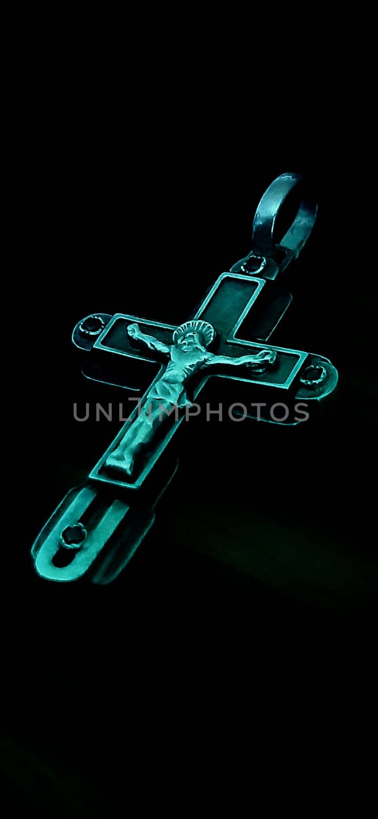 The cross is located in the center on a black background.
 Looks beautiful on the PC screen.