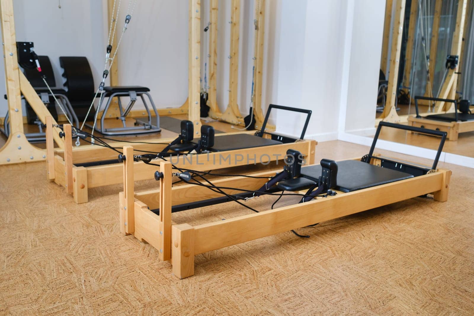 the reformer machine in the pilates room. Yoga equipment.