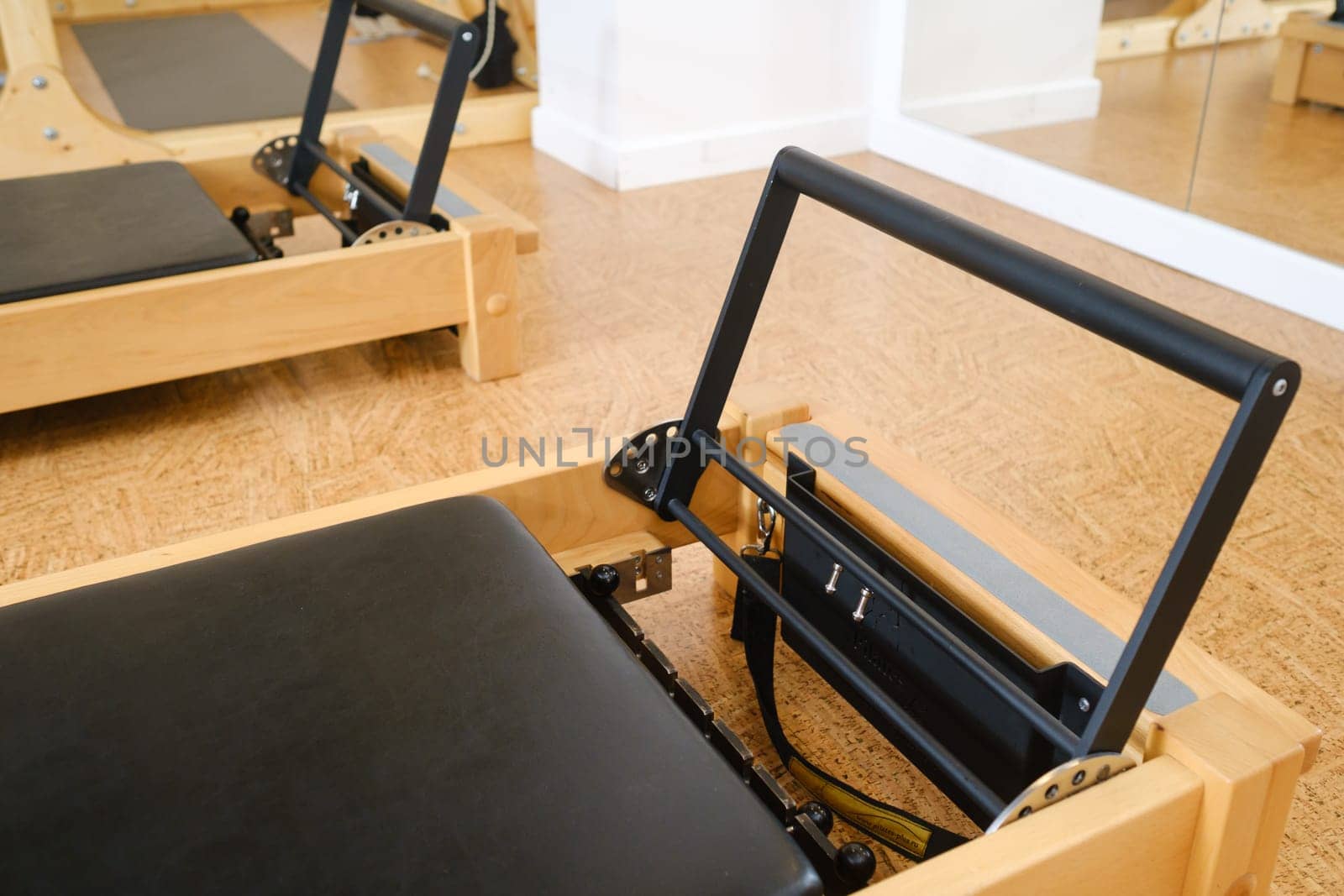 the reformer machine in the pilates room. Yoga equipment.