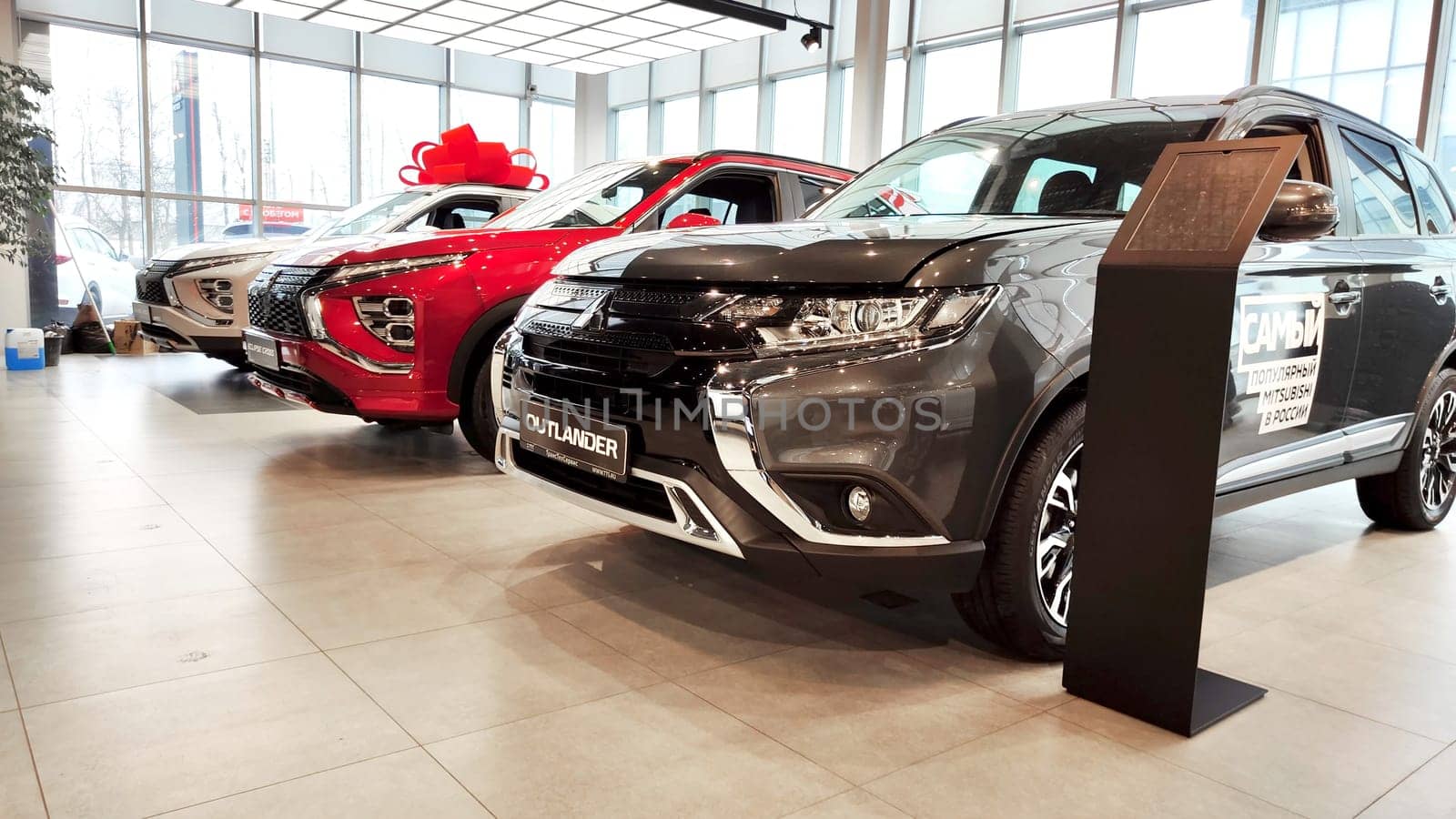 Cheboksary, Russia - March 20, 2023: Car in showroom of dealership Mitsubishi by keleny