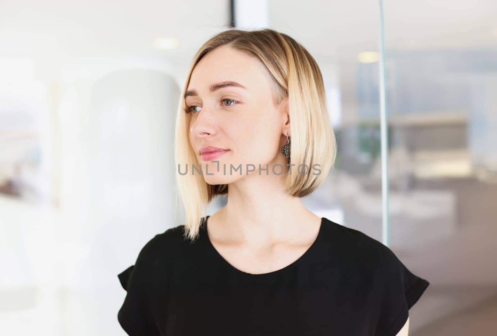 portrait of young beautiful blond woman business concept