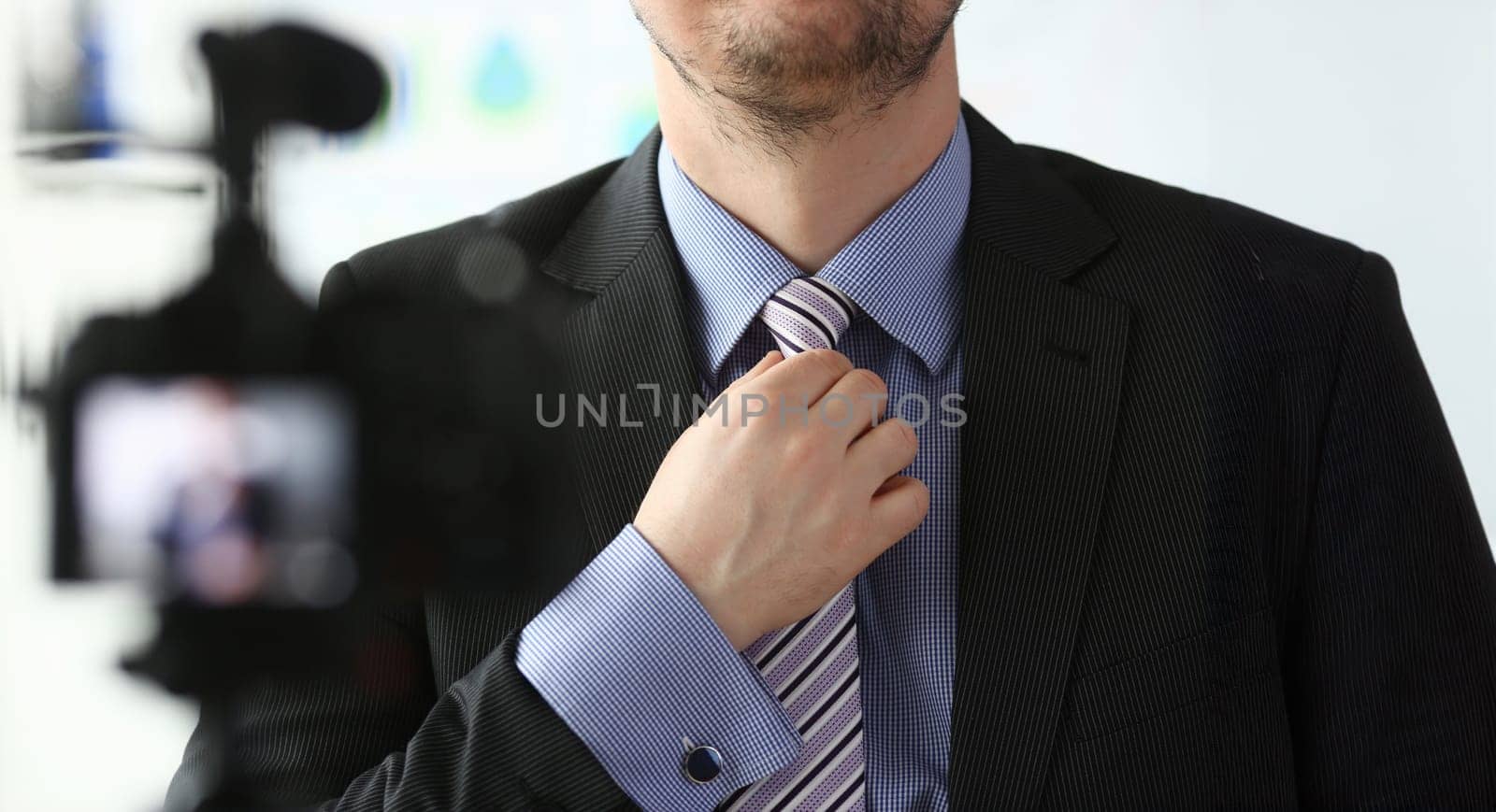 Male arm in blue suit set tie closeup on by kuprevich