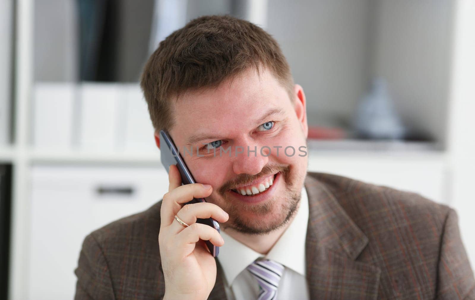 Handsome smiling businessman talk cellphone in office portrait. Stay in touch solution negotiate meeting job white collar busy life style electronic device store professional training concept