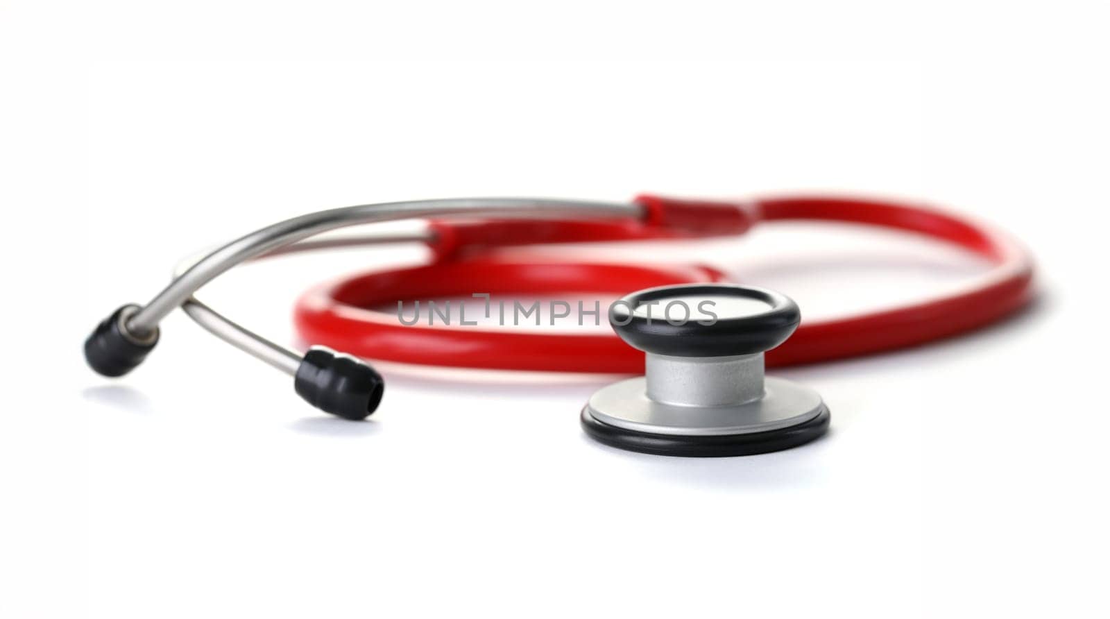 Red stethoscope with black silver head isolated on whote background. Medical education object concept