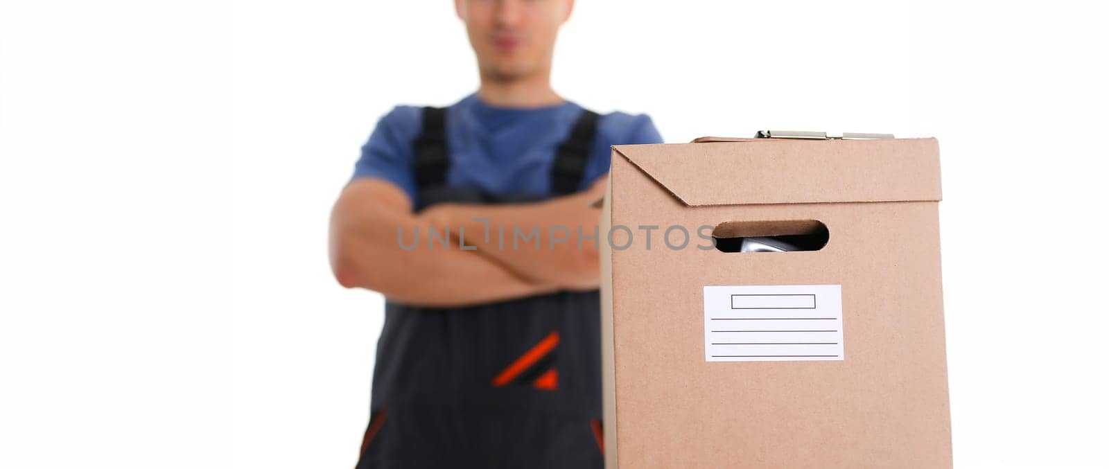 Specialist courier delivery service carries boxes with parcels things of customers working as a loader delivers everything to the specified addresses, ready to fulfill any order at a specified time