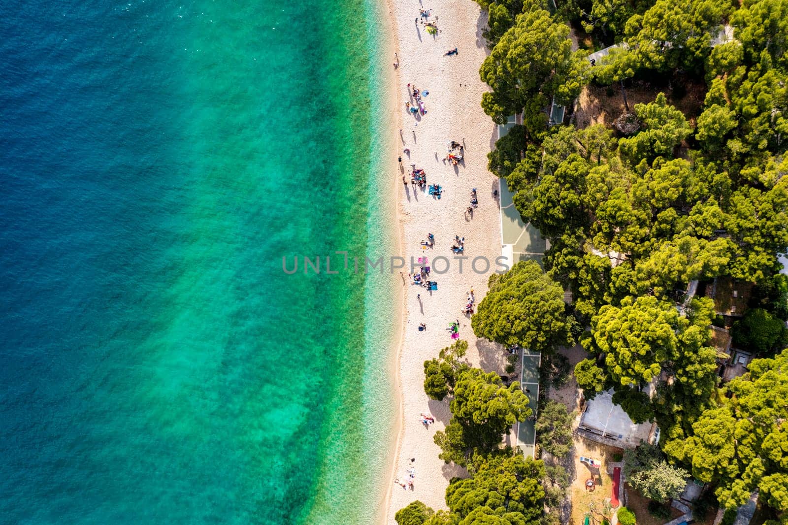 Beautiful aerial view of Punta Rata beach in Brela, Makarska Riviera, Croatia. Aerial view of Punta Rata beach and waterfront on Makarska riviera, Brela, Dalmatia region of Croatia.