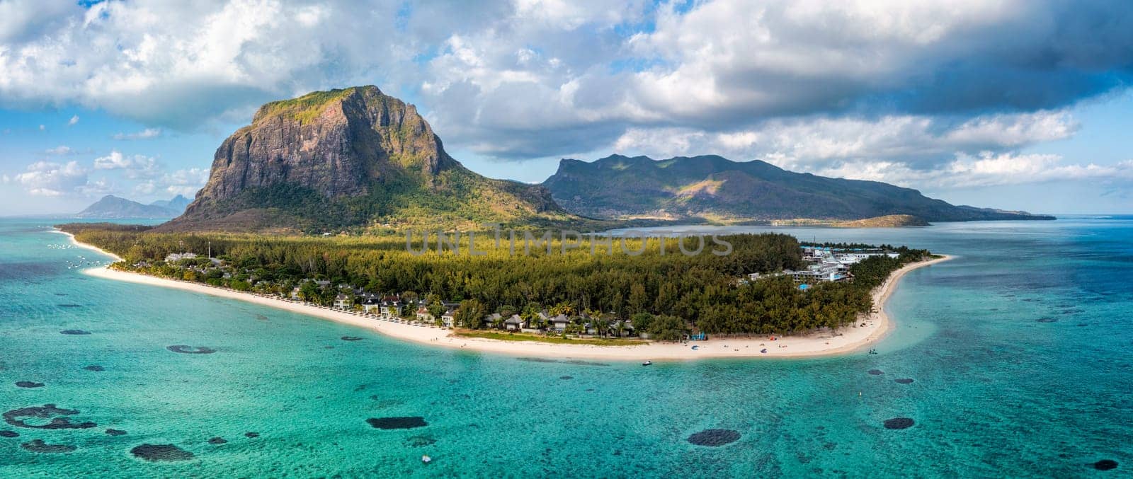 Tropical scenery, beautiful beaches of Mauritius island, Le Morne, popular luxury resort. Le Morne beach luxury resorts, Mauritius. Luxury beach in Mauritius, sandy beach with palms and blue ocean. 