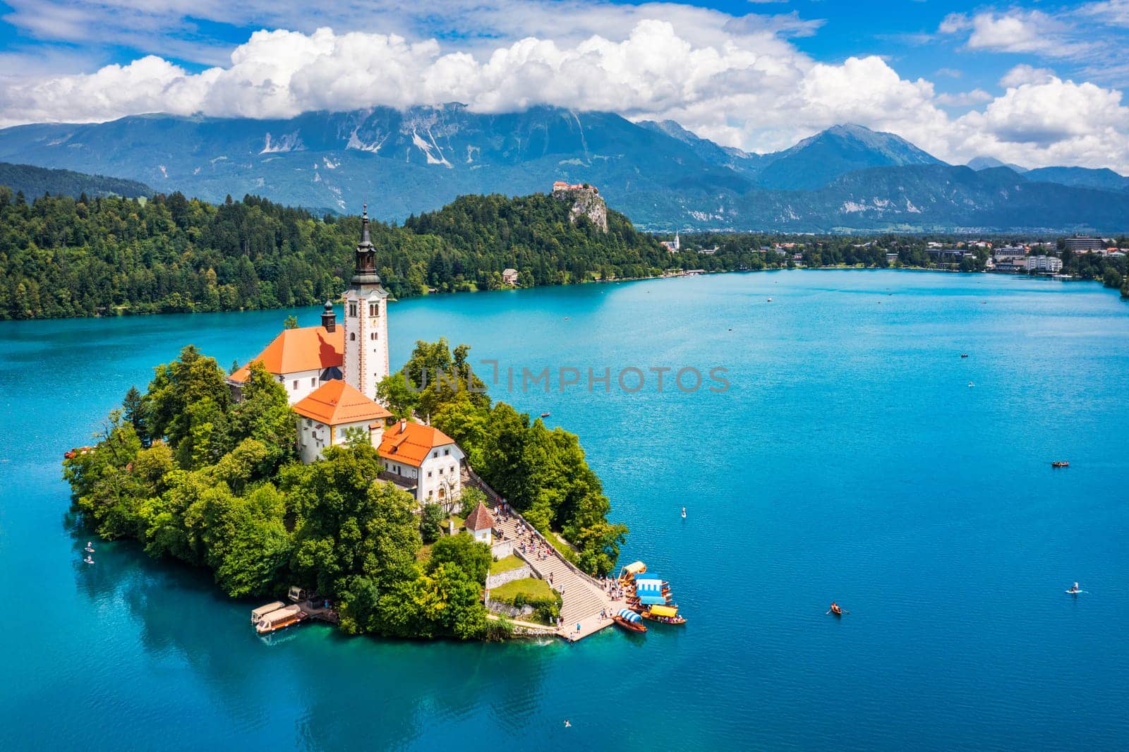 Lake Bled in Slovenia. Beautiful mountains and Bled lake with small Pilgrimage Church. Bled lake and island with Pilgrimage Church of the Assumption of Maria. Bled, Slovenia, Europe.