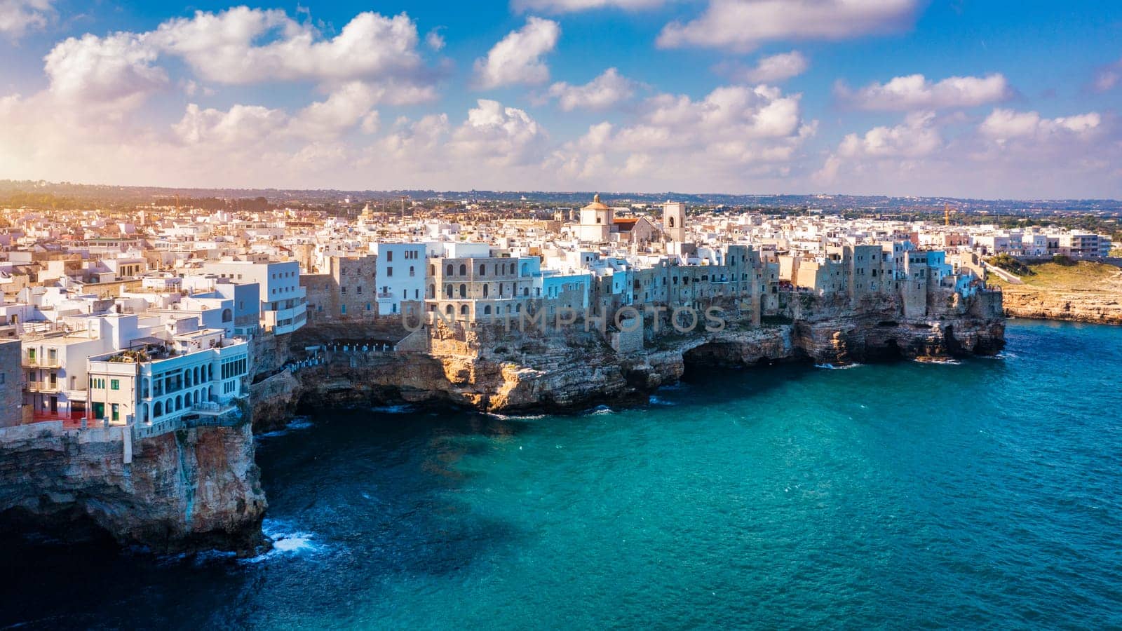 Spectacular cityscape of Polignano a Mare town, Puglia region, Italy, Europe. Polignano Al Mare, scenic small town in Puglia, Italy. Polignano a Mare village on the rocks, Bari, Apulia, Italy. 