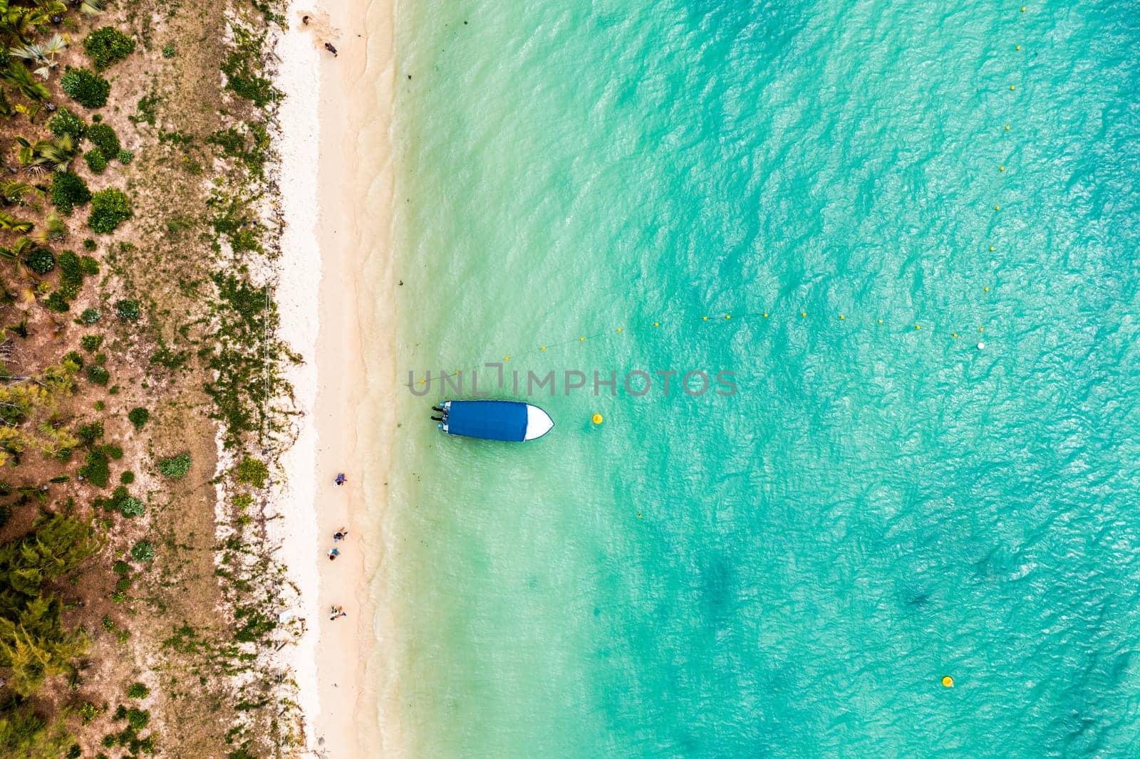 Mauritius beach aerial view of Mont Choisy beach in Grand Baie, Pereybere North. Mont Choisy, public beach in Mauritius island, Africa. Beautiful beach of Mont Choisy in Mauritius, drone aerial view.