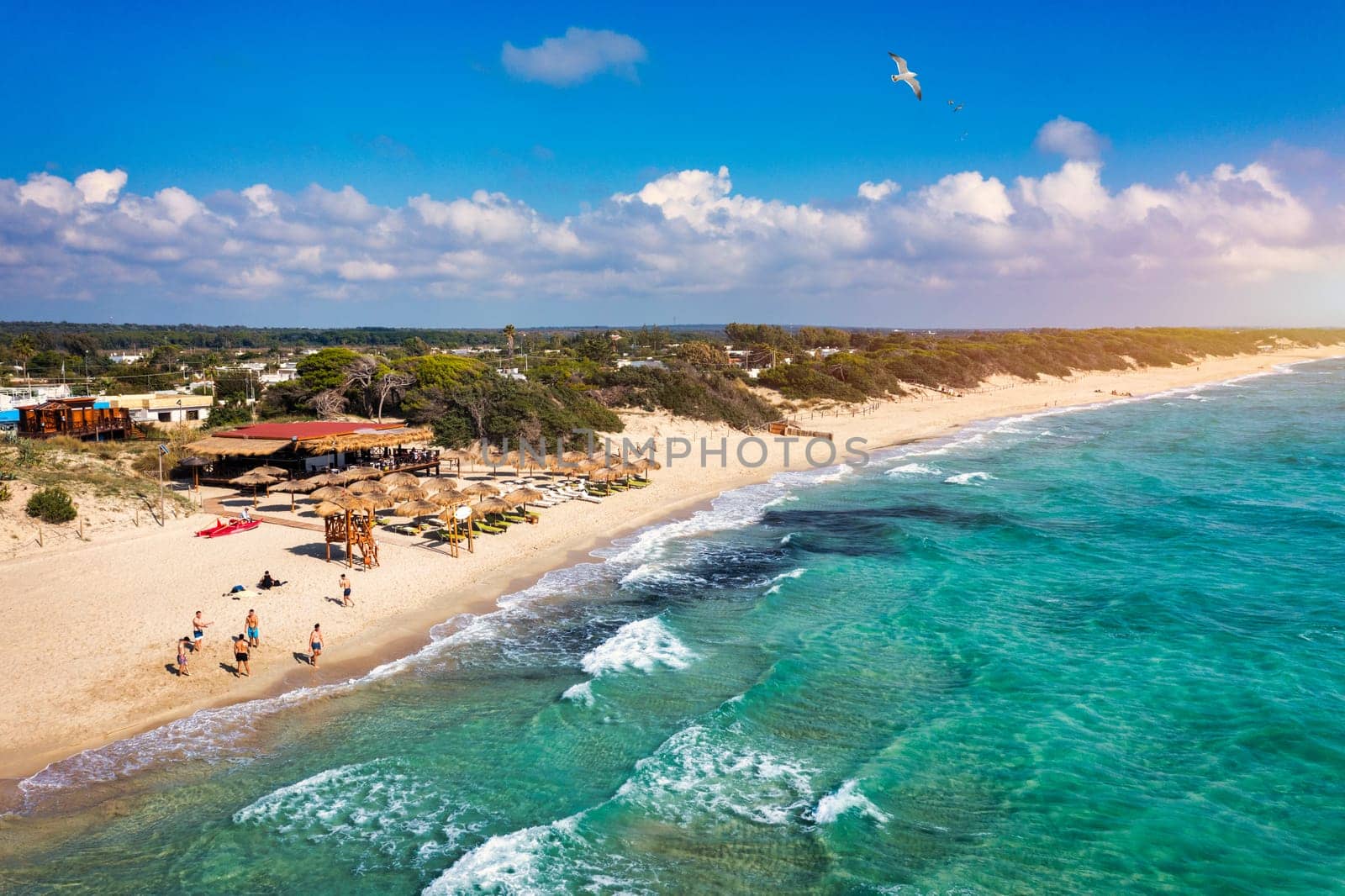 Punta Prosciutto azure sea water, crystal clear water on beach Punta Prosciutto, Italian Maldives Puglia Italy. Punta Prosciutto in Apulia, one of the most beautiful beaches of Italy.