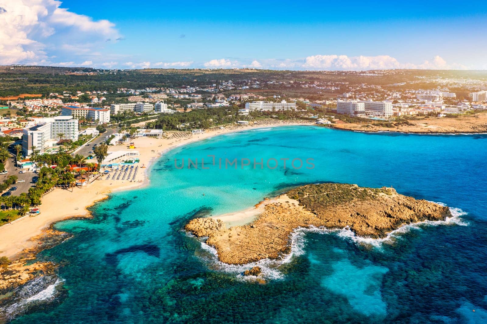 Aerial view of beautiful Nissi beach in Ayia Napa, Cyprus. Nissi beach in Ayia Napa famous tourist beach in Cyprus. A view of a azzure water and Nissi beach in Aiya Napa, Cyprus. by DaLiu