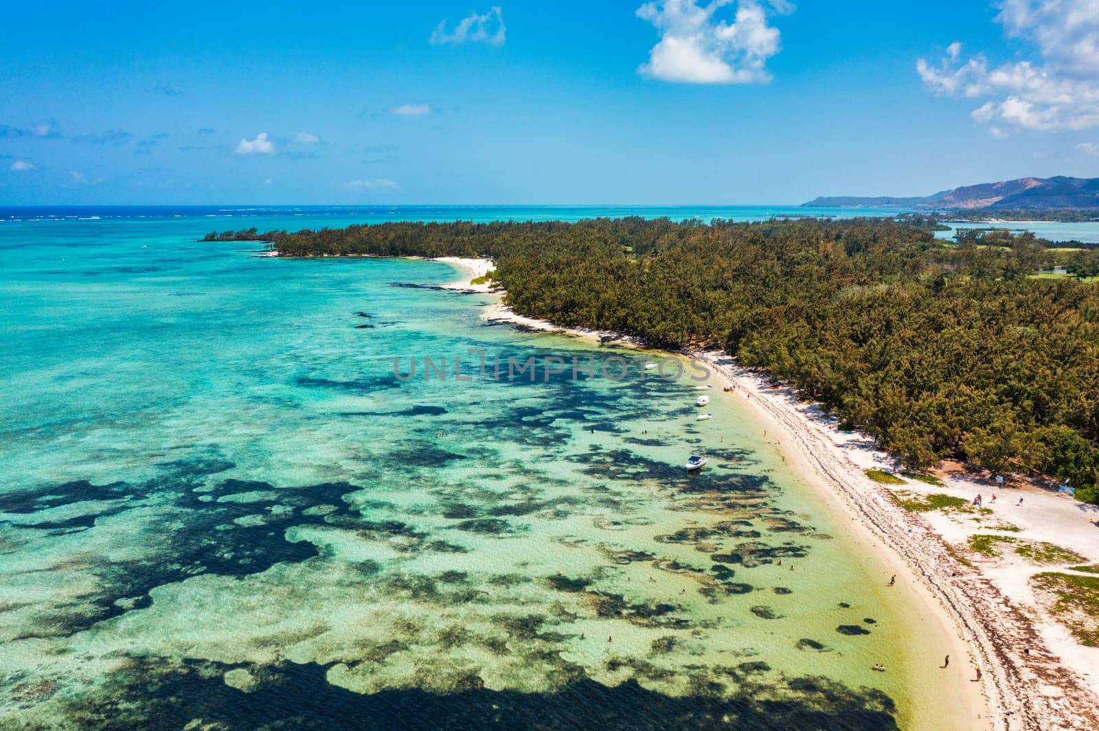 Ile aux Cerfs island with idyllic beach scene, aquamarine sea and soft sand, Ile aux Cerfs, Mauritius, Indian Ocean, Africa. Ile aux Cerf in Mauritius, beautiful water and breathtaking landscape.